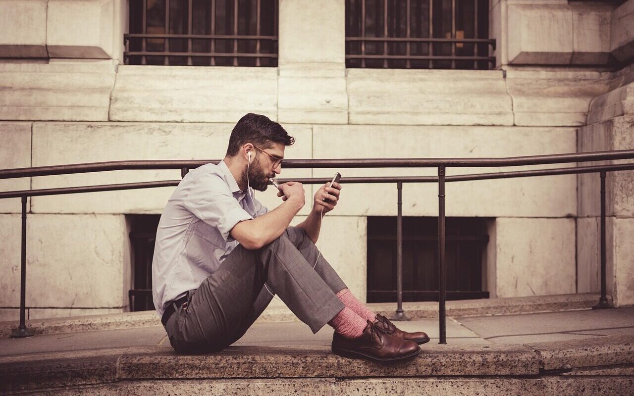 brown leather shoes, man, earphones, fashion, male, model, person, smartphone, leisure, sitting, urban, brown city, brown phone, brown fashion, brown mobile, brown model, brown shoes, brown smartphone, brown telephone, earphones, smartphone, smartphone, smartphone, smartphone, smartphone